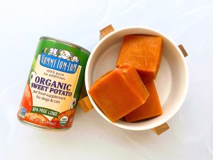a can of Nummy Tum-Tum sweet potato with frozen cubes